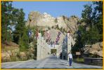 Mount Rushmore Over Flags